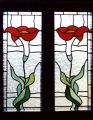 Stained glass on a window - red flowers